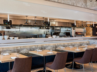 The open kitchen inside Wolfgang Puck Kitchen + Bar